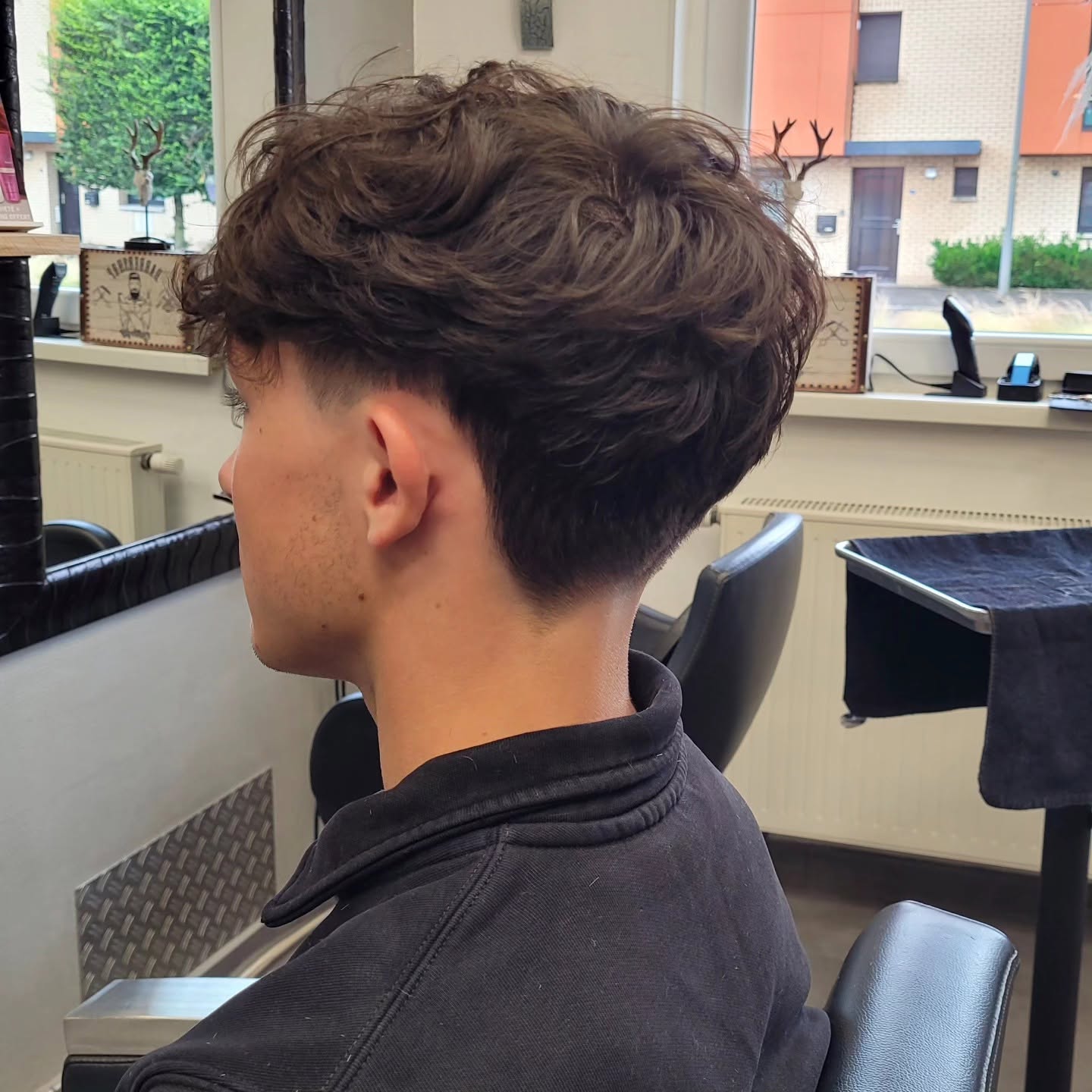 Coupe homme texturée réalisée chez Carré d'Hair